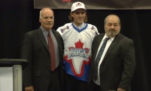 Toronto Rock Head Coach John Lovell(Right), Ethan O'Connor (Middle), GM Terry Sanderson (right) pose after selecting their 9th overall selection at the 2013 NLL Draft.  