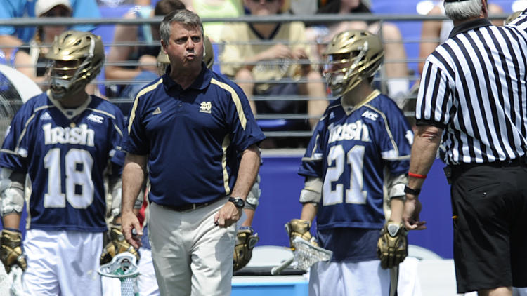 Notre Dame men's lacrosse coach Kevin Corrigan speaks to the referee in the first half of an NCAA championship lacrosse game against Duke on Monday, May 26, 2014, in Baltimore. (Gail Burton / Associated Press)