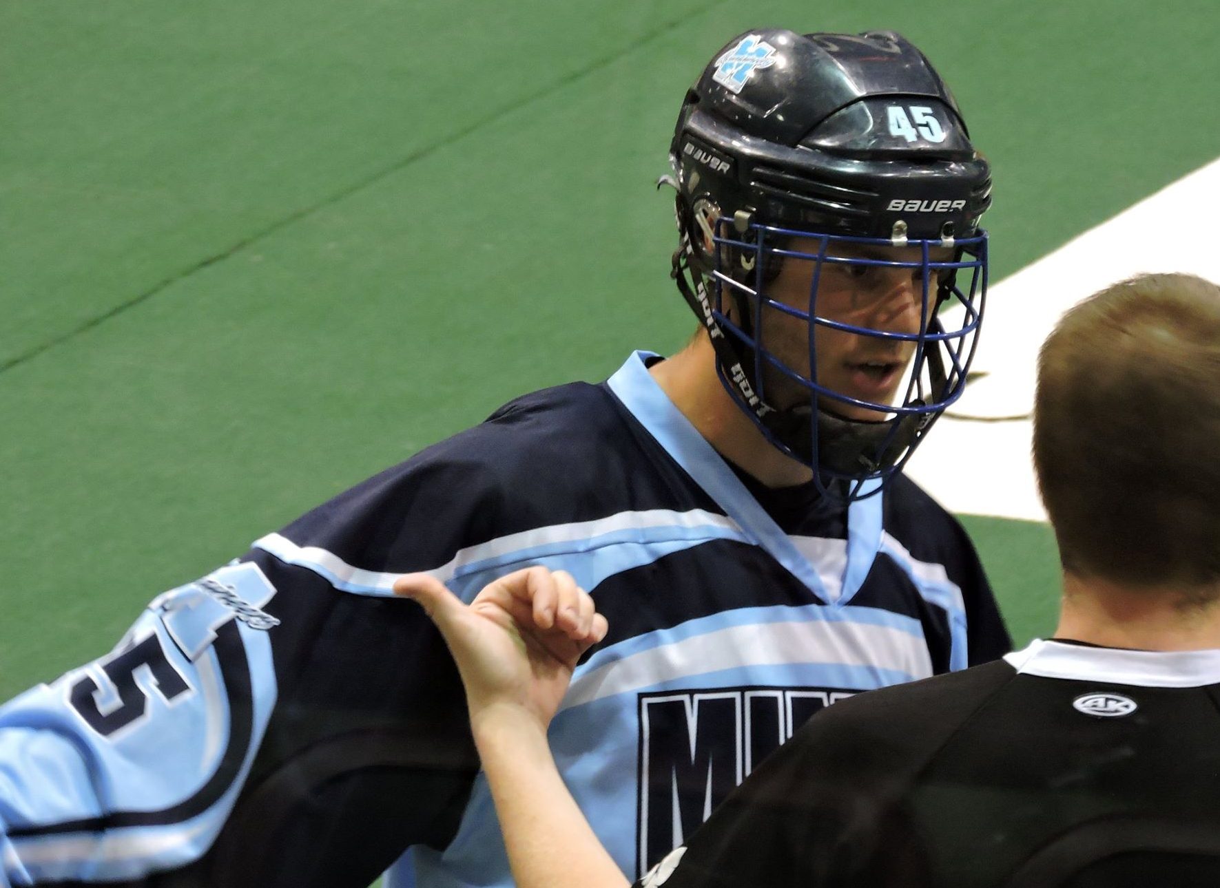 James Barclay of the Mimico Mountaineers chats with referee Andrew Ecclestone during OJALL action on June 6, 2017. (Photo credit: Anna Taylor)