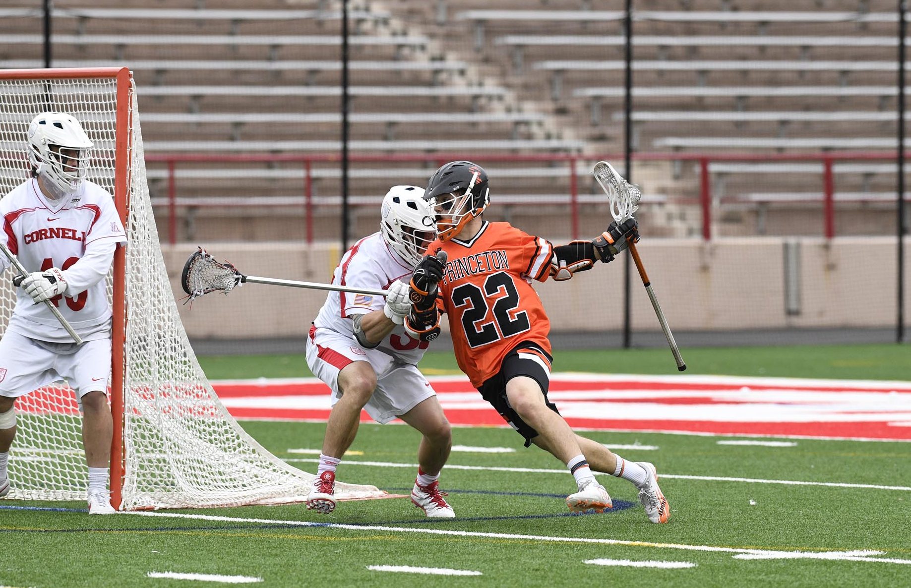 Michael Sowers of the Princeton Tigers fights off a Cornell Big Red defender on April 29, 2017. (Photo credit: Robert Goldstein)