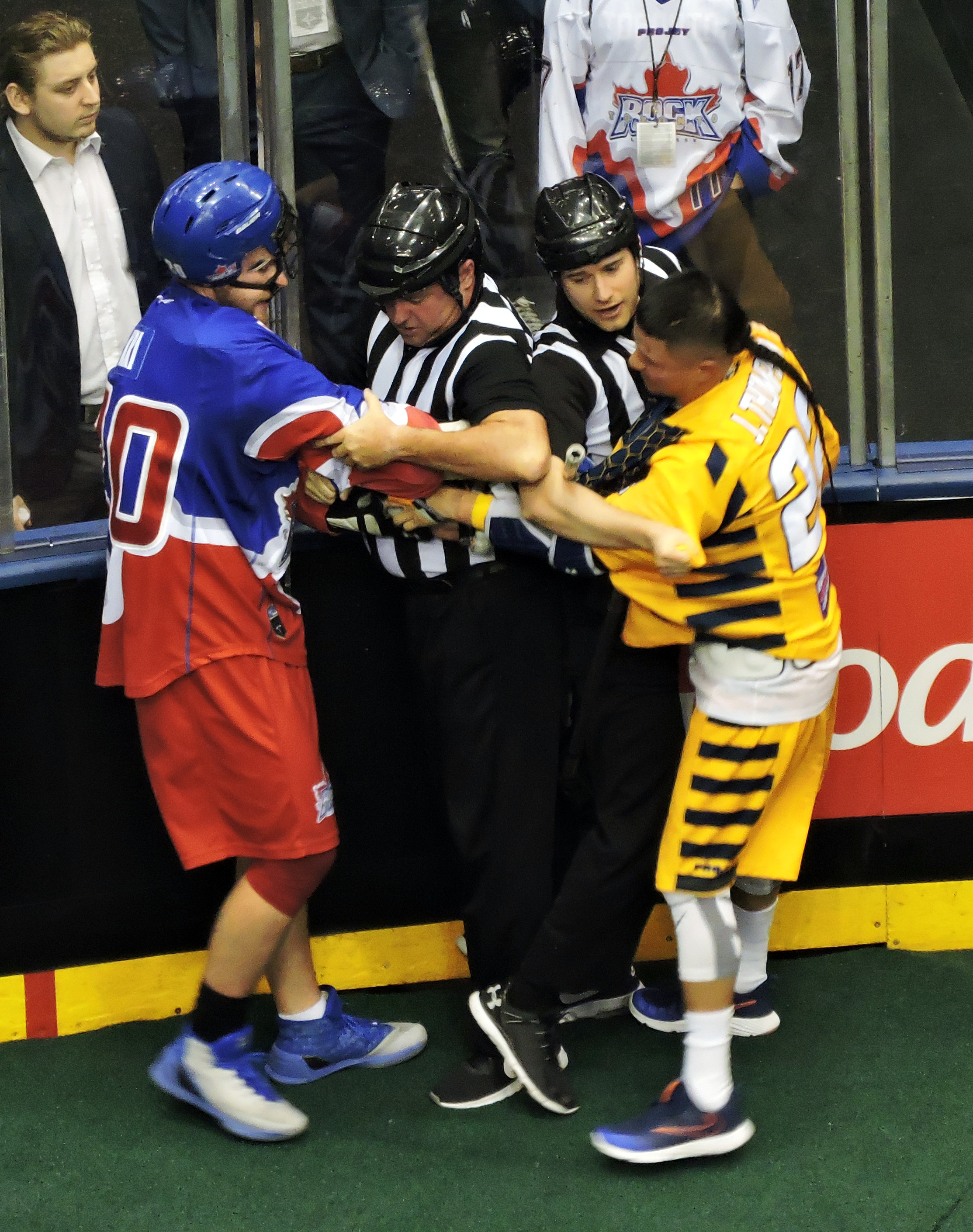 Bradley Kri of the Toronto Rock and Jerome Thompson of the Georgia Swarm exchange words at the end of the east division semi-final on May 13, 2017 at the Air Canada Centre. (Photo credit: Anna Taylor)