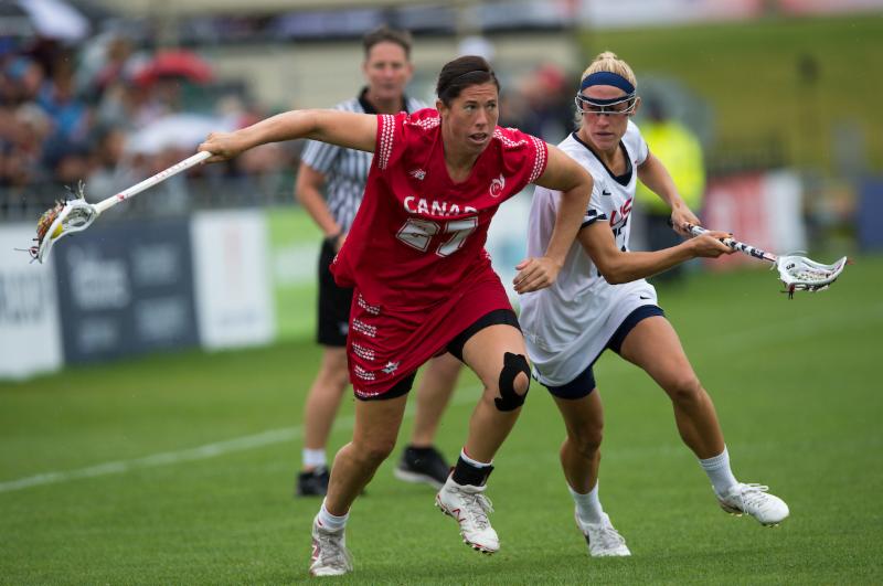 USA's Becky Block challenges with Canada's Dana Dobbie during the World Cup Final at the 2017 FIL Rathbones Women's Lacrosse World Cup, at Surrey Sports Park, Guildford, Surrey, UK, 22nd July 2017. (Credit Ady Kerry).