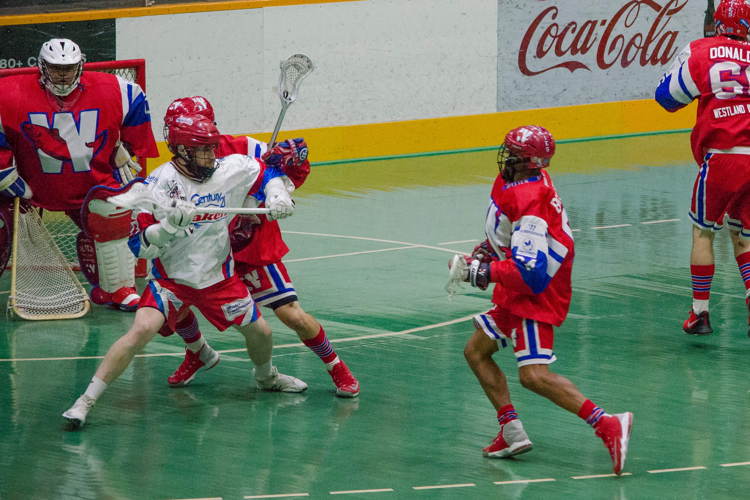 Curtis Dickson of the Peterborough Lakers fights off a New Westminster Salmonbellies defender during the 2017 Mann Cup. (Photo credit: Kendall Taylor)