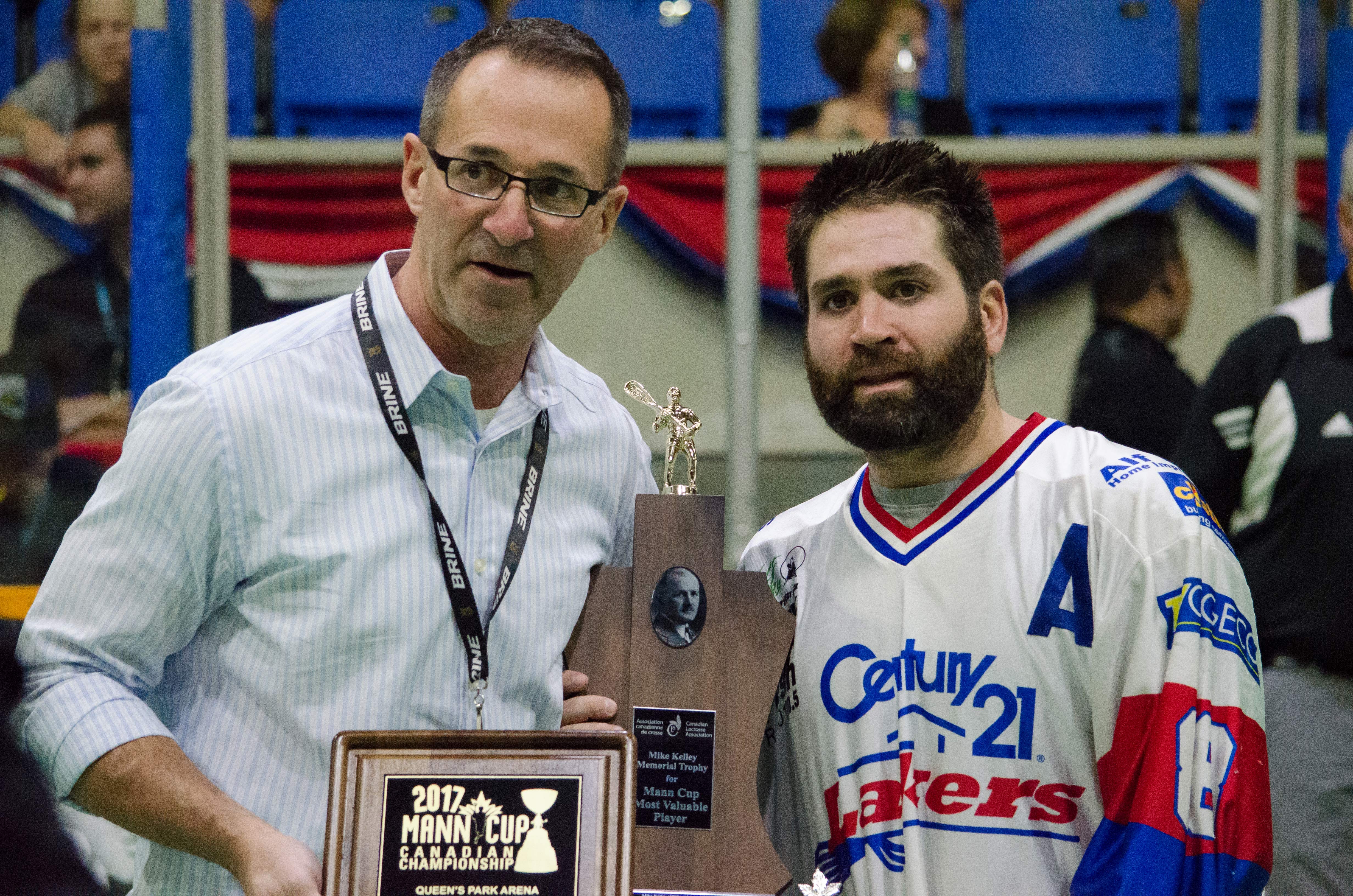 WLA commissioner Paul Dal Monte presents the Peterborough Lakers' Shawn Evans with the Mike Kelley award as Mann Cup MVP. (Photo credit: Kendall Taylor)