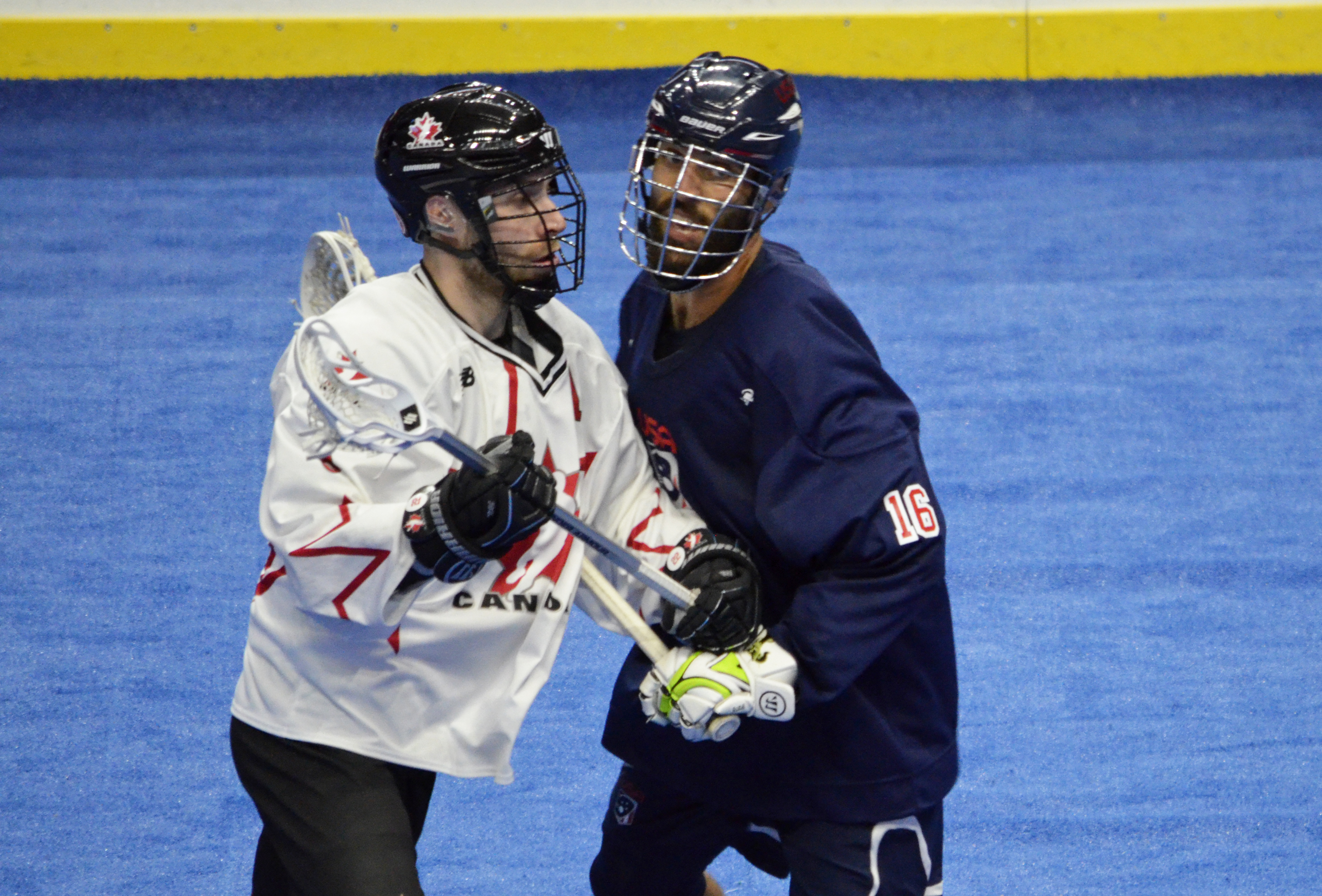 Paul Rabil of Team USA tries to get around Team Canada defender Ryan Dilks during the 2017 Heritage Cup in Hamilton, Ont. (Photo credit: Anna Taylor)