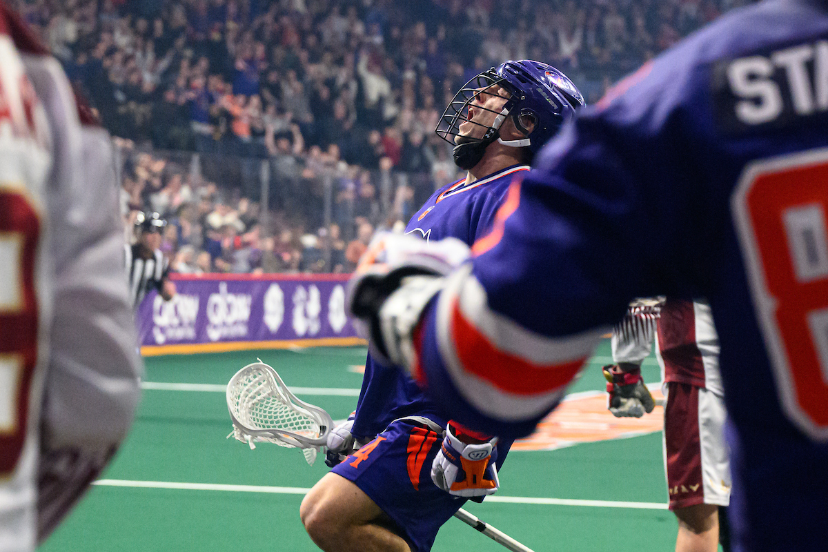 Clarke Petterson celebrates a goal for the Thunderbirds as teammate Randy Staats looks on.